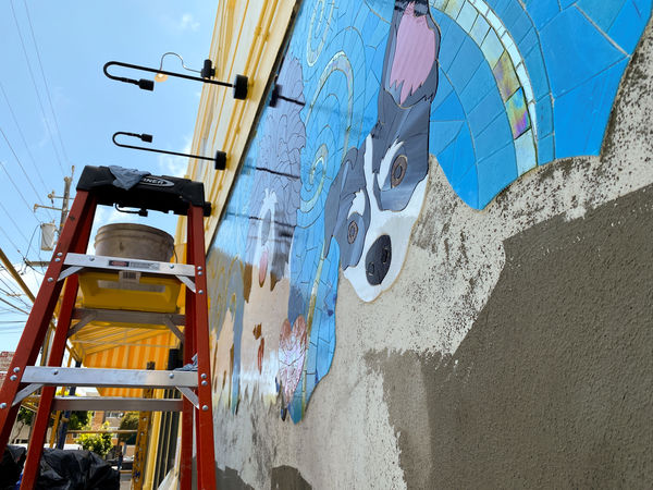 Assembling the mosaic on the front of our home